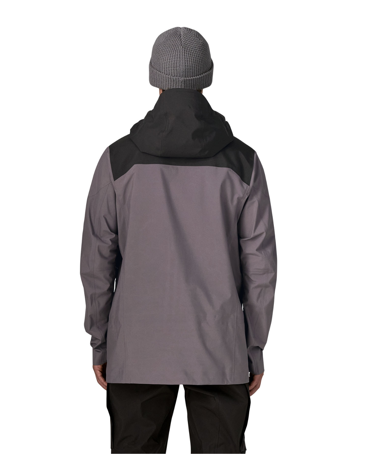 Patagonia PowSlayer Jacket Men i grått ses bakifrån på en skidåkare med grå mössa.