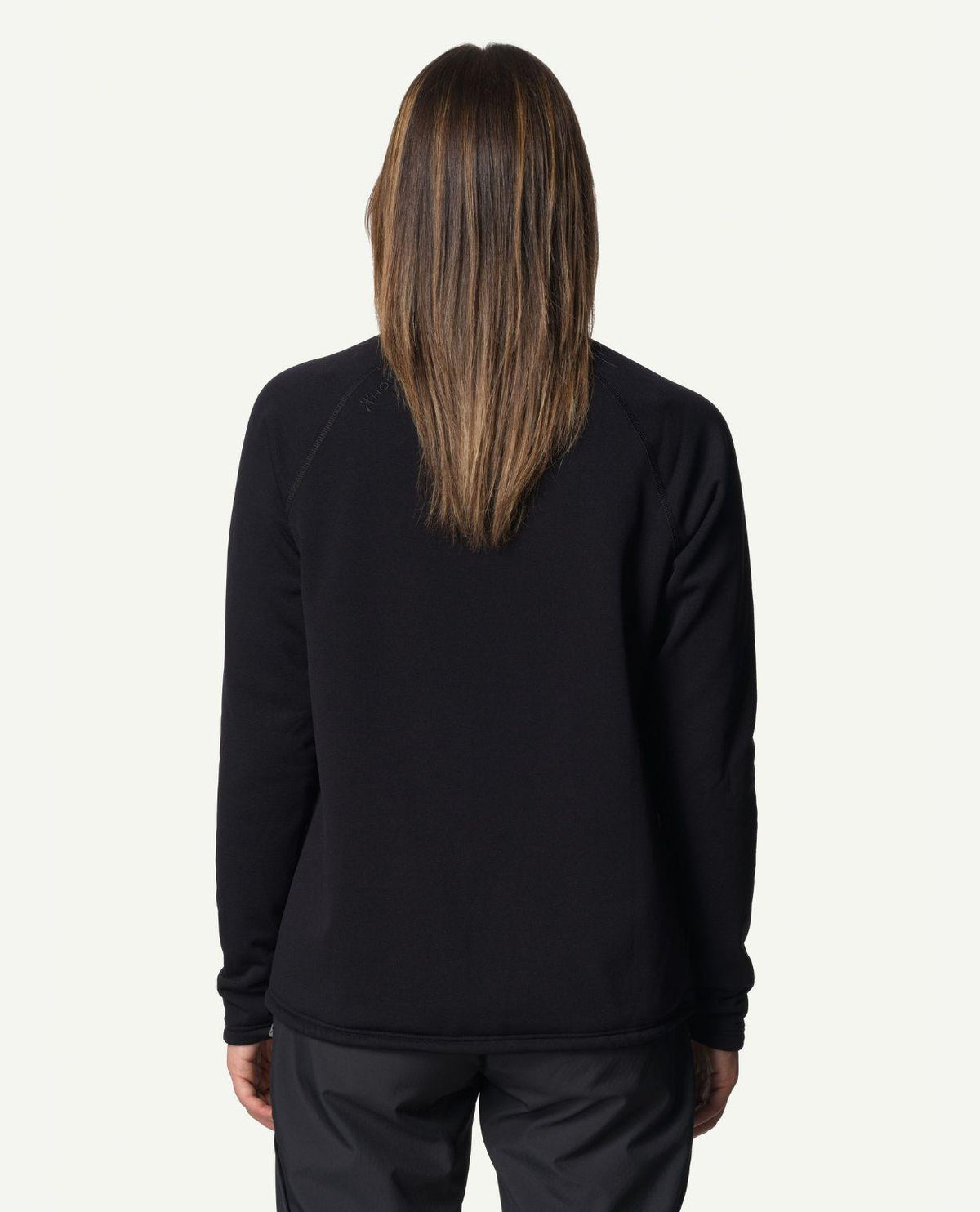 Baksidesvy av Houdini Power Up Jacket för damer i färgen True Black.