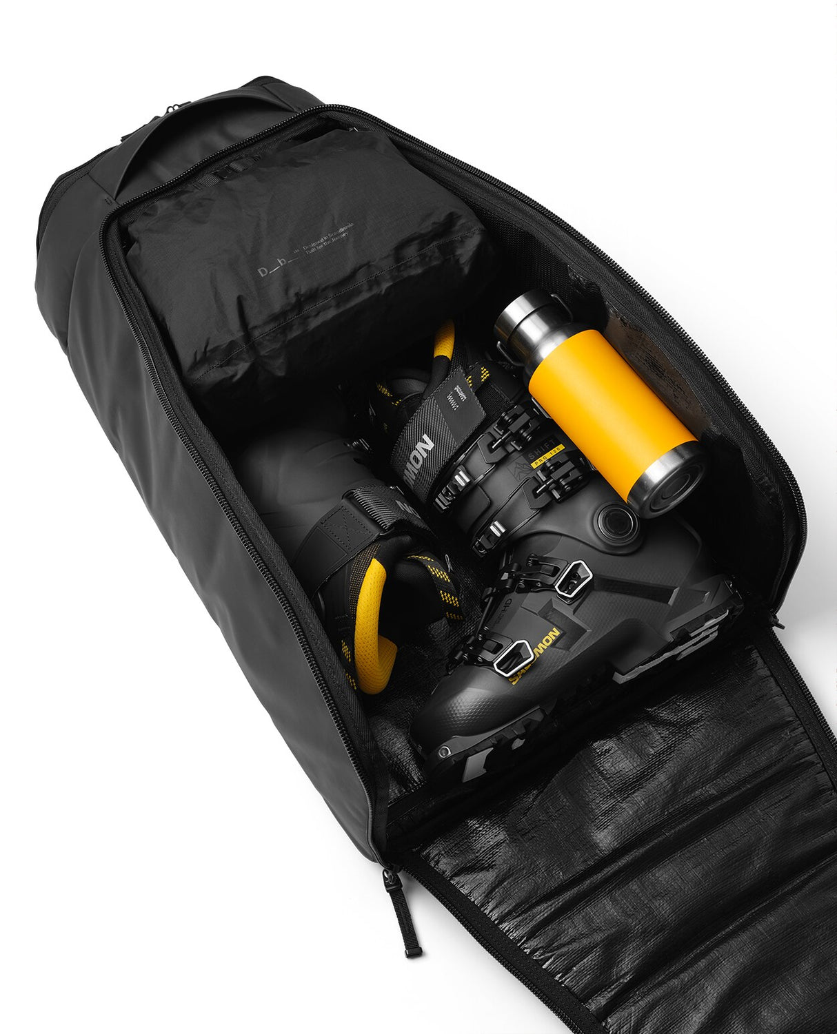 D_b_ Hugger Bootpack 45L - Black Out