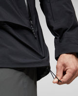 Närbild på justering av midjan på svarta Mammut Haldigrat Gore-Tex HS Thermo Hooded Jacket för herr.