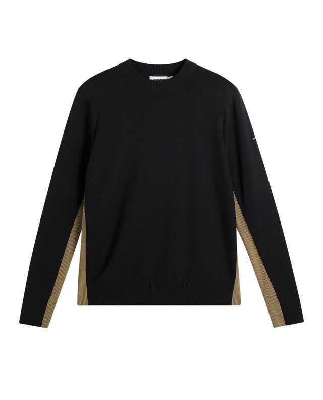 J.Lindeberg Chester Side Stripe Knit Crew herrtröja i svart med bruna sidopaneler.