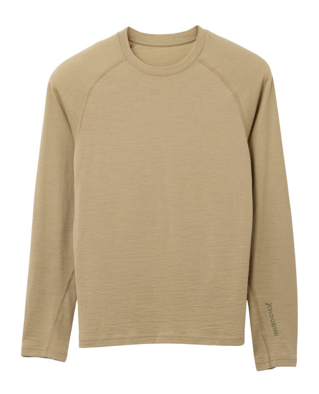 Houdini Puremerino Crew dam i färgen powder green, ett långärmat underställ i merinoull med rund halsringning.
