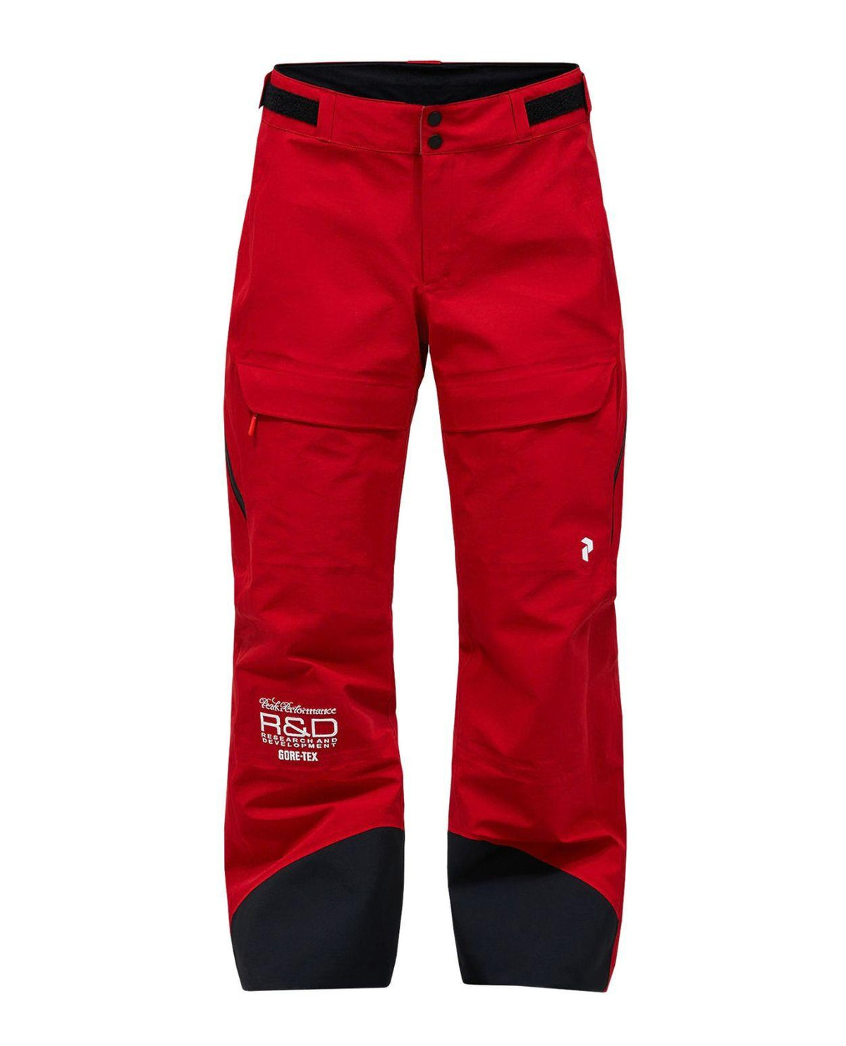 Peak Performance 40Y R&D Gore-Tex skidbyxor dam i rosa med tekniska detaljer.