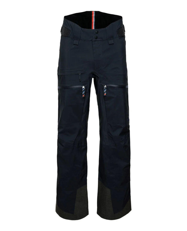 Elevenate Pure Pants Women mörkblå skidbyxor för dam med dragkedjor framtill.