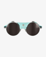 Julbo Vermont Classic Spectron 4 solglasögon i ljusblått med runda mörka linser och praktiska sidoskydd.