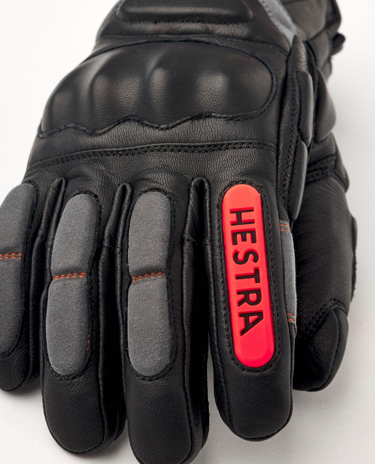 Hestra Impact Racing Sr. 5 Finger - Svart tävlingshandske med knogskydd och flame red-detaljer