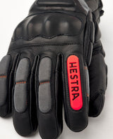 Hestra Impact Racing Sr. 5 Finger - Svart tävlingshandske med knogskydd och flame red-detaljer