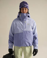 Arc'teryx Sidewinder skidjacka för dam i lila nyanser med asymmetrisk dragkedja.
