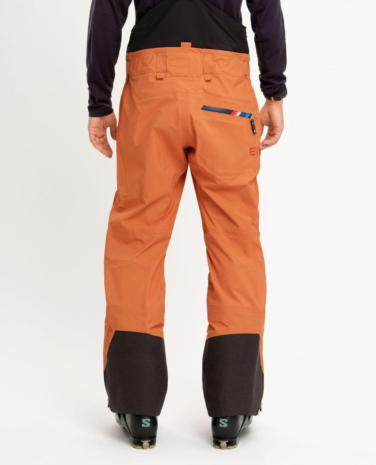 Elevenate Bec de Rosses XI Pants Men - Orange Apricot skidor byxa bakifrån med Gore-Tex