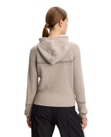 J.Lindeberg Hilda Knitted Rib Hoodie dam i färgen moonbeam sett bakifrån.