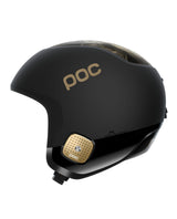 POC Skull Dura Junior Marco Odermatt Ed. i färgerna Uranium Black och Podium Gold för alpin skidåkning.