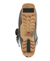 Undersida av Salomon Shift Alpha BOA 130 grön alpinpjäxa som visar GripWalk-sulan.