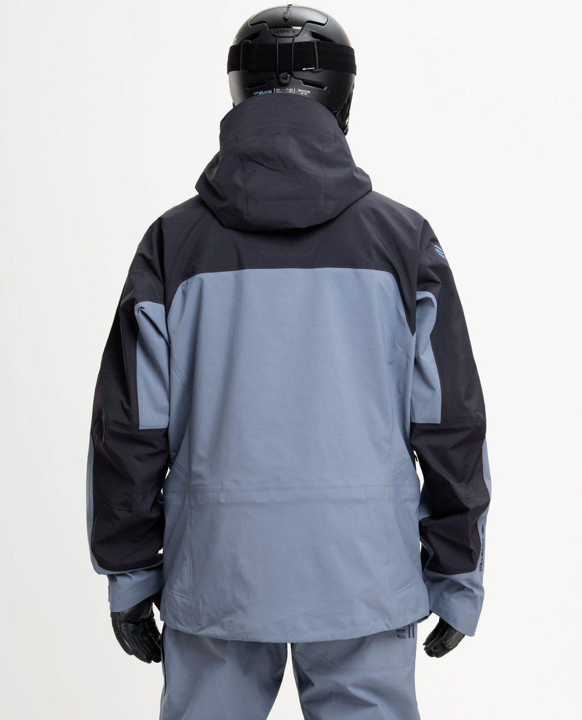 Elevenate Bec de Rosses XI Jacket Men i färg Blue Flint, bakifrån. En teknisk GORE-TEX-skidjacka för herr.