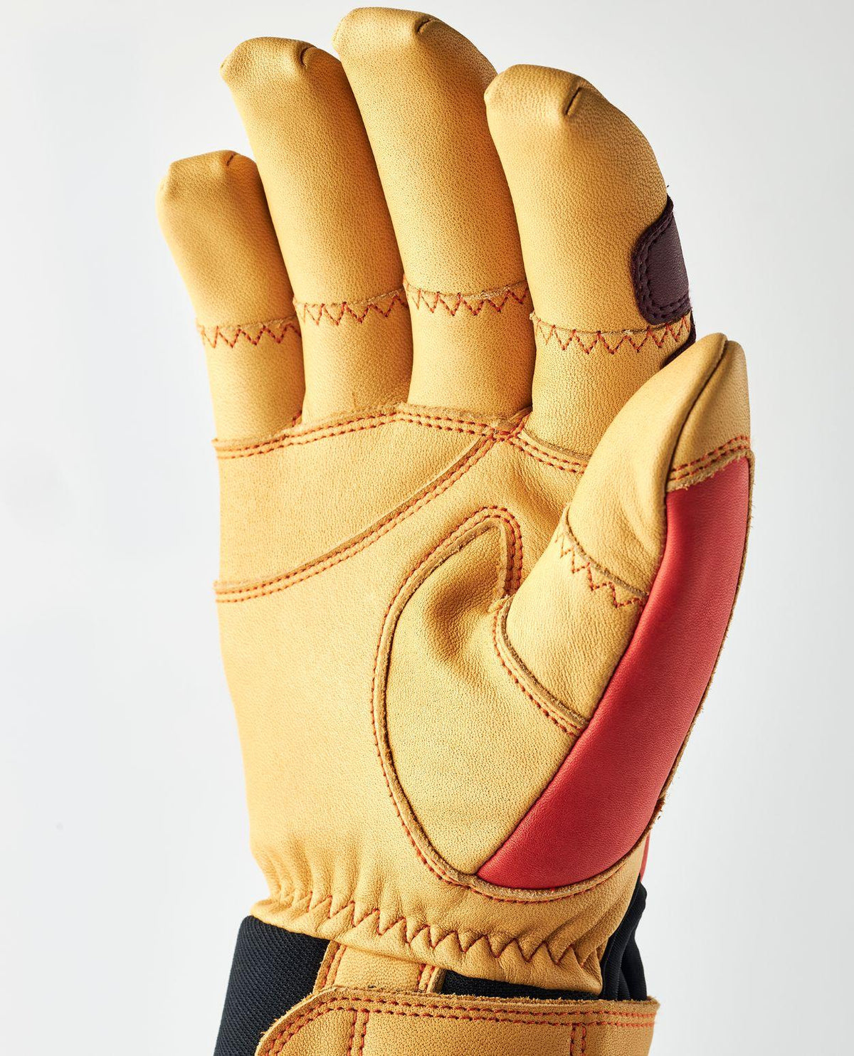 Hestra CZone Incline 5 Finger i Flame Red - handflatan visar följsam nötnappa och ergonomisk design.