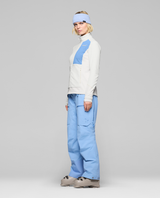 Norrøna Lofoten warm2 Jacket Women i Whisper White och Allure på modell från sidan.