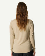 Bakifrån på person som bär Houdini Puremerino Crew Women i färgen Powder Green.