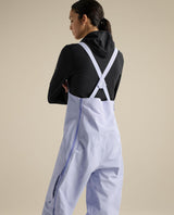Arc'teryx Sentinel Bib dam i lila färgen Kasumi bakifrån visande hängslen och passform för skidåkning.