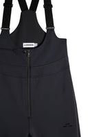 J.Lindeberg Aviana Softshell Bib Pant Women i svart, detaljbild på hängslen och dragkedja.