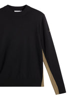 J.Lindeberg Chester Side Stripe Knit Crew i svart för herrar med stickad design och snygga sidoränder.